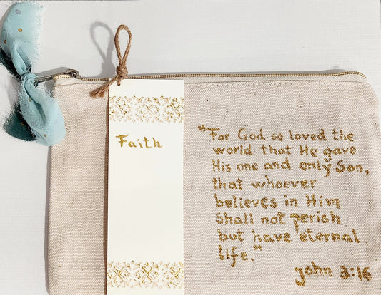 A beautiful handmade cotton pouch inspired by Bible verse John 3:16 written in golden text with a Bookmark with the text Faith