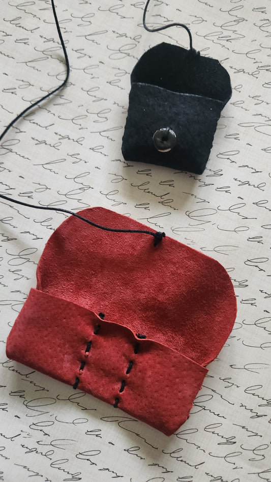 Handmade suede leather pouch (1.5" x 3.5") with 3 compartments, perfect for keeping rings, earrings, necklaces, or bracelets safe and scratch-free. Compact, elegant, and travel-friendly