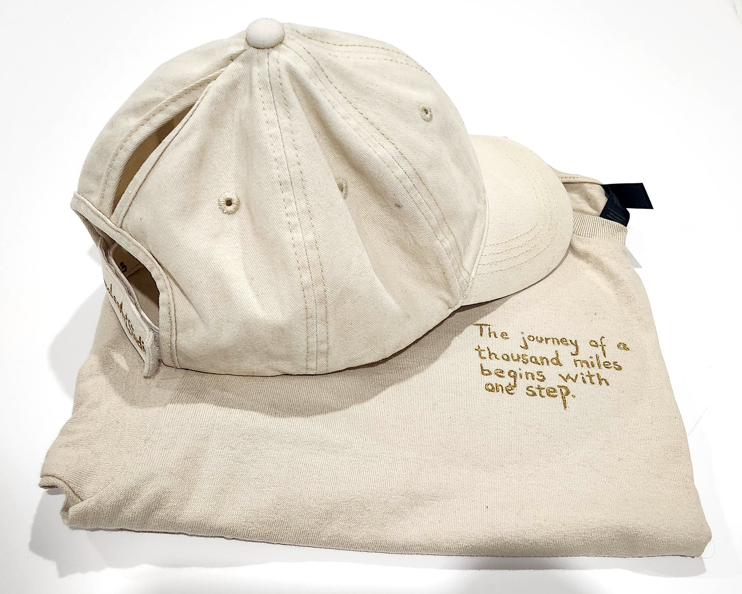 Customizable t shirt and ponytail cap, quotes on apparel