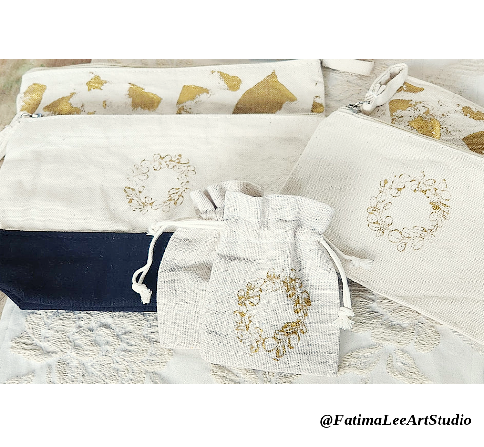 Three hand-painted cotton pouches with golden metallic details