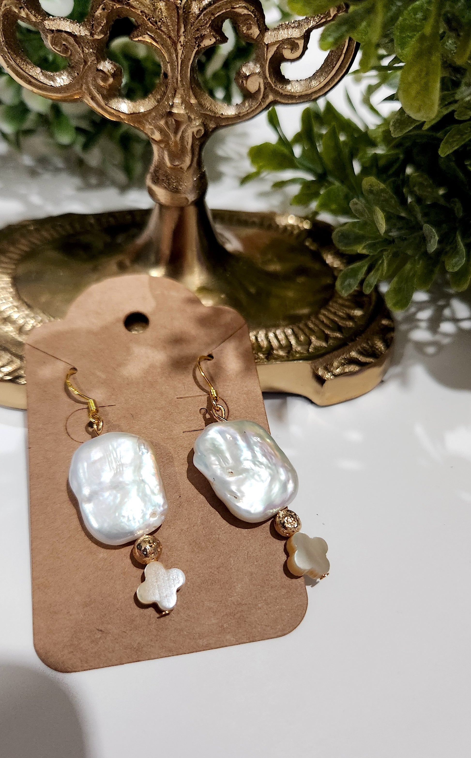Wide Freshwater pearl earrings with volcano stones and cross shaped beige shell. Gold plated 18k on sterling silver